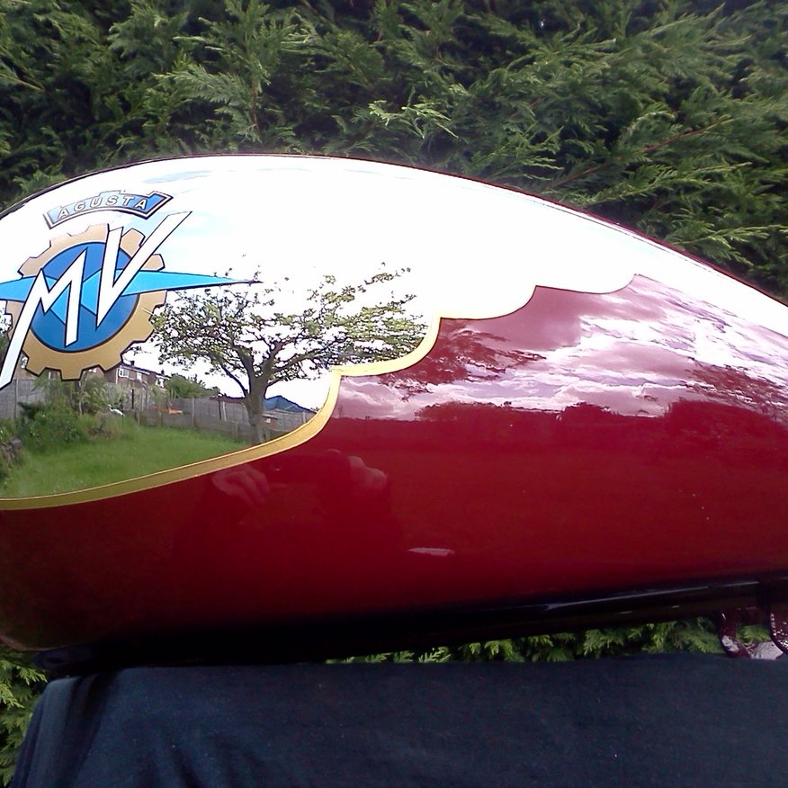 MV Agusta motorcycle petrol tank chrome and red paint